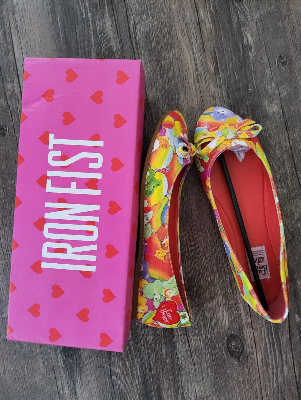 Iron Fist Women’s Care Bears Rainbow Bow Ballet Flats